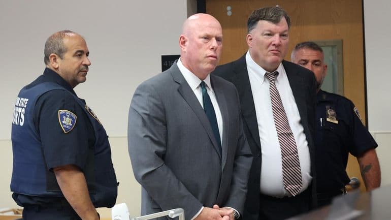 Alleged Gilgo serial killer Rex Heuermann appears in courtroom at Suffolk County Court in Riverhead with his attorney Michael J. Brown on Tuesday, Sept. 23, 2025.